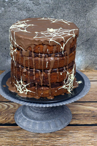 orchideli tort dyniowy na halloween przekładany ganache z gorzkiej i mlecznej czekolady, tort dyniowy z czekoladą
